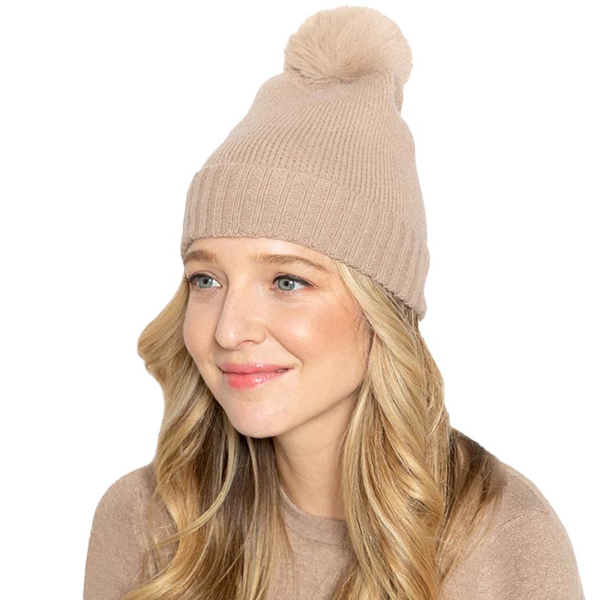 Taupe Solid Knit Beanie Hat With Faux Fur Pom, accessorize the fun way with this faux fur pom solid knit beanie hat to keep yourself warm and toasty and enrich your beauty with luxe. The autumnal touch you need to finish your outfit in style. Awesome winter gift accessory! Perfect Gift for Birthdays, Christmas, holidays, anniversaries, and Valentine’s Day to your friends, family, and Loved Ones. 