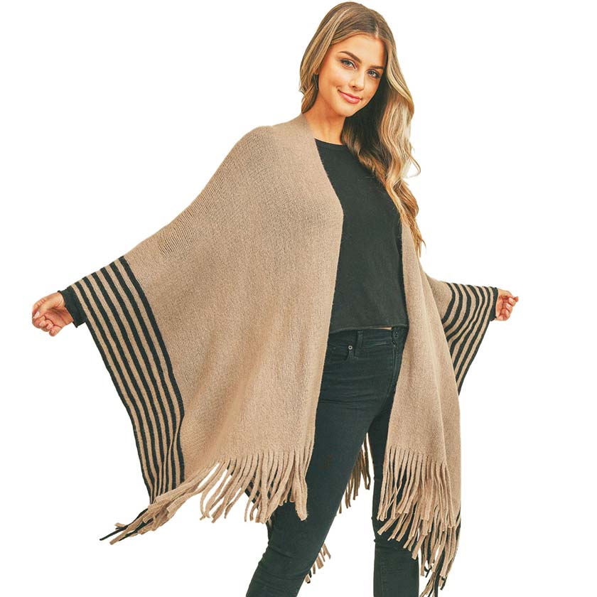 Taupe Stripe Pattern Bottom Ruana, amps up your beauty with confidence with this beautiful bottom poncho. You can stand out with the contrast of different outfits. Snowflake patterned with beautiful design gives a unique decorative and fashionable look that makes your day with beautiful moments. Match perfectly with jeans and T-shirts or a vest. A perfect eye-catcher and will become one of your favorite accessories quickly.