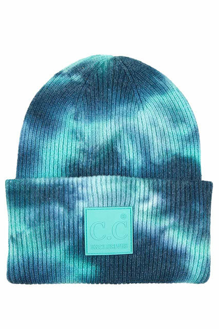 Teal Green C.C Tie Dye Beanie With Rubber Patch, Before running out the door into the cool air, you’ll want to reach for this toasty beanie to keep you incredibly warm. Whenever you wear this beanie hat with you'll look like the ultimate stylist. Accessorize the fun way with this rubber patch hat, it's the autumnal touch you need to finish your outfit in style. 