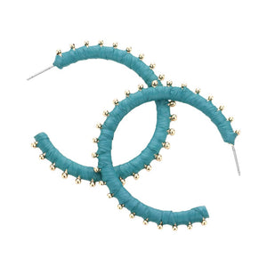 Teal Metal Ball Trimmed Raffia Wrapped Hoop Earrings, enhance your attire with these beautiful raffia earrings to show off your fun trendsetting style. Get a pair as a gift to express your love for any woman person or for just for you on birthdays, Mother’s Day, Anniversary, Holiday, Christmas, Parties, etc.