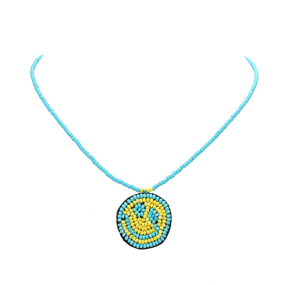 Turquoise Felt Back Seed Beaded Smile Pendant Necklace, this beautiful Smile-themed pendant necklace is the ultimate representation of your class & beauty.  Perfect for adding just the right amount of shine and a touch of class this any happy moments. Perfect gift for Birthdays, valentine's day & other meaningful occasions.