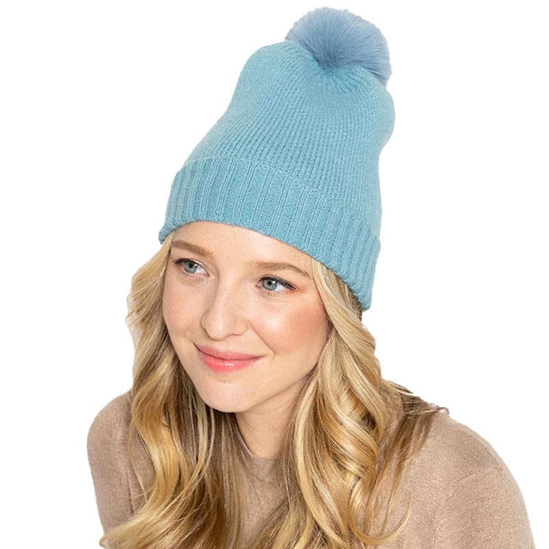 Turquoise Solid Knit Beanie Hat With Faux Fur Pom, accessorize the fun way with this faux fur pom solid knit beanie hat to keep yourself warm and toasty and enrich your beauty with luxe. The autumnal touch you need to finish your outfit in style. Awesome winter gift accessory! Perfect Gift for Birthdays, Christmas, holidays, anniversaries, and Valentine’s Day to your friends, family, and Loved Ones. 