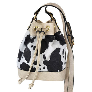 White Adjustable Cow Patterned Faux Leather Drawstring Crossbody Bag. Look like the ultimate fashionista carrying this small quilted bag! It will be your new favorite accessory. Easy to carry specially lightweight ideal for a night out on the town.  Perfect Gift for Birthday, Holiday, Christmas, New Years, Anniversary.