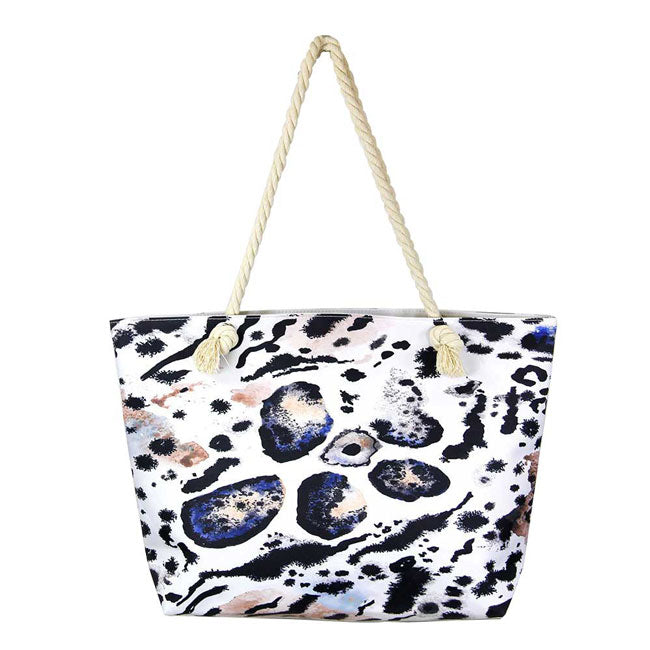 White Animal Print Beach Bag. Whether you are out shopping, going to the pool or beach, this animal print bag is the perfect accessory. Spacious enough for carrying any and all of your seaside essentials. The soft rope straps really helps carrying this tie due shoulder bag comfortably. Folds flat for easy packing. Perfect Birthday Gift, Anniversary Gift, Mother's Day Gift, Vacation Getaway or Any Other occasions.