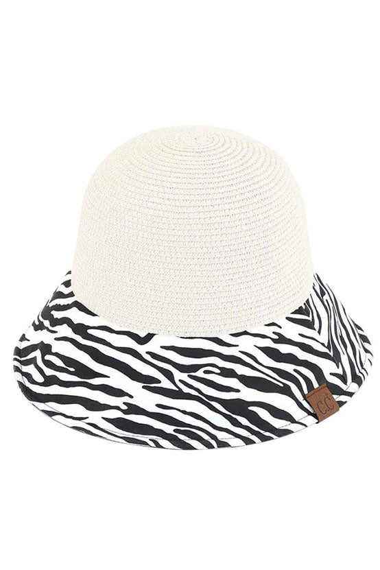 White C.C Zebra Print Cloche Straw Bucket Hat. Keep your styles on even when you are relaxing at the pool or playing at the beach. Large, comfortable, and perfect for keeping the sun off of your face, neck, and shoulders Perfect summer, beach accessory. Ideal for travelers who are on vacation or just spending some time in the great outdoors.