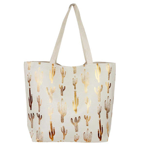 White Cactus Foil Beach Bag, Show your trendy side with this awesome cactus print beach tote bag. Spacious enough for carrying any and all of your seaside essentials. The soft rope straps really helps carrying this shoulder bag comfortably. Folds flat for easy packing. Perfect as a beach bag to carry foods, drinks, big beach blanket, towels, swimsuit, toys, flip flops, sun screen and more.