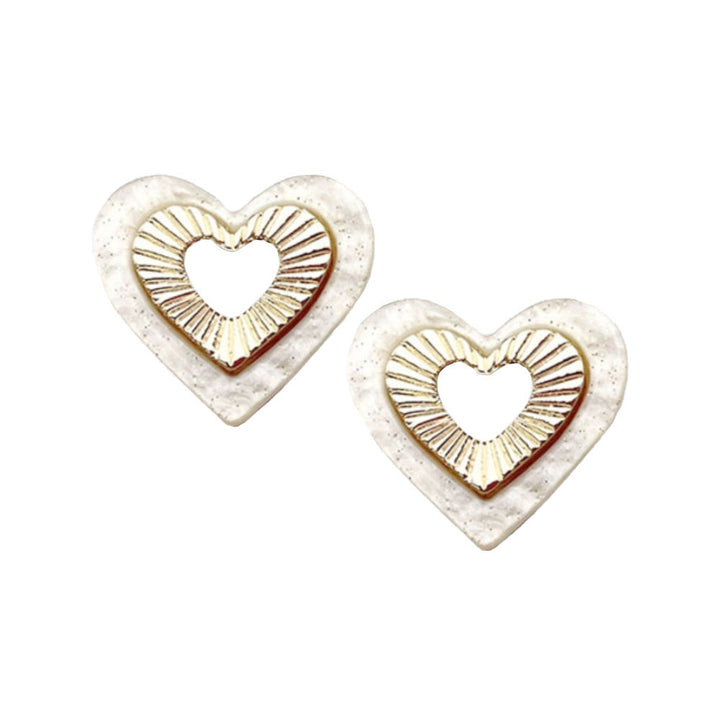 White Celluloid Acetate Heart Trimmed Stud Earrings. Beautifully crafted design adds a gorgeous glow to any outfit. Jewelry that fits your lifestyle! Perfect Birthday Gift, Anniversary Gift, Mother's Day Gift, Anniversary Gift, Graduation Gift, Prom Jewelry, Just Because Gift, Thank you Gift.