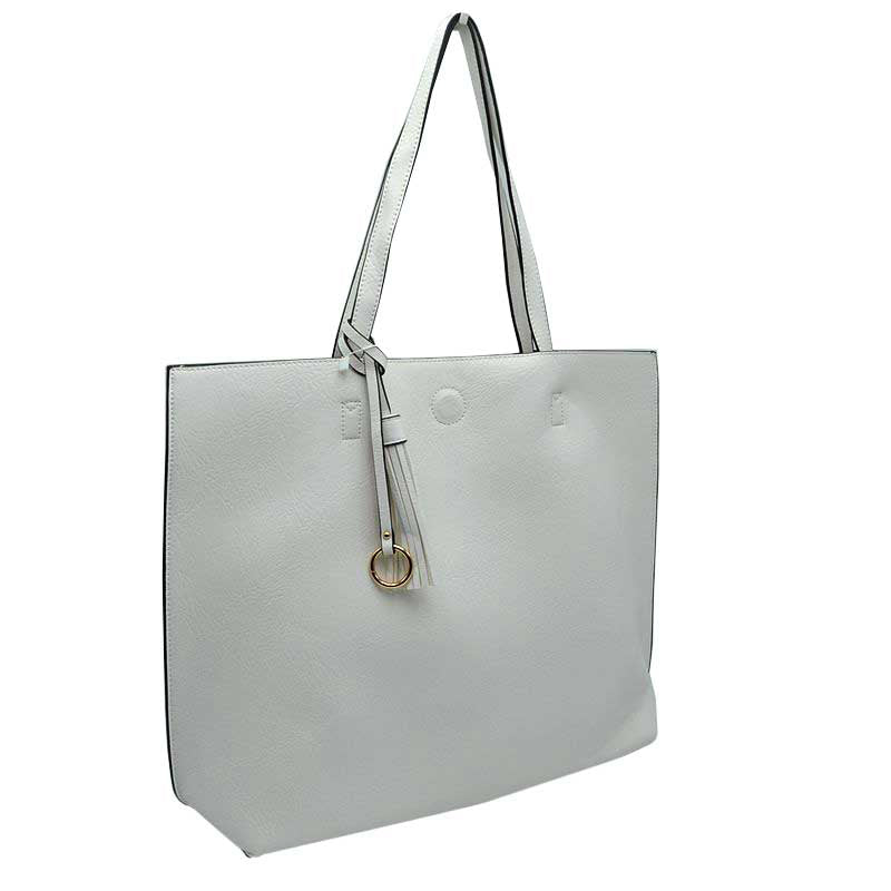 White Large Tote Reversible Shoulder Vegan Leather Tassel Handbag, High quality Vegan Leather is a luxurious and durable, Stay organized in style with this square-shaped shopper tote purse that is fully reversible for two contrasting interior and exterior solid colors. This vegan leather handbag includes an on-trend removable tassel embellishment. Guaranteed, This will be your go-to handbag. 