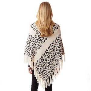 White Leopard Patterned Poncho, is a luxurious and trendy that enriches your beauty in a greater extent. It's super soft chic capelet which keeps you warm, toasty and so comfortable. You can throw it on over so many pieces elevating any casual outfit! Perfect Gift for Wife, Mom, Birthday, Holiday, Christmas, Anniversary, Fun Night Out. Stay trendy and comfortable!