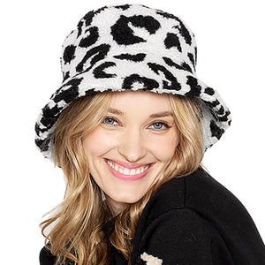 White One Size Leopard Patterned Faux Fur Bucket Hats, stay warm and cozy, protect yourself from the cold, this most recognizable look with remarkable bold, soft & chic bucket hat, features a rounded design with a short brim. The hat is foldable, great for daytime. Perfect Gift for cold weather!
