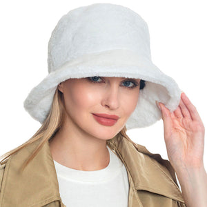 White Trendy & Fashionable Winter Faux Fur Solid Bucket Hat. Before running out the door into the cool air, you’ll want to reach for this toasty beanie to keep you incredibly warm. Accessorize the fun way with this beanie hat, it's the autumnal touch you need to finish your outfit in style. Awesome winter gift accessory!