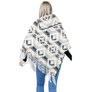 White Western Pattern Tassel Poncho, is beautifully designed with different attractive colors that brings out the luxe into your look. Can be paired with so many tops. It ensures your upper body stays perfectly toasty when the temperatures drop. It's Lightweight and Breathable Fabric, Comfortable to Wear. It gently nestles around the neck and feels exceptionally comfortable to wear.