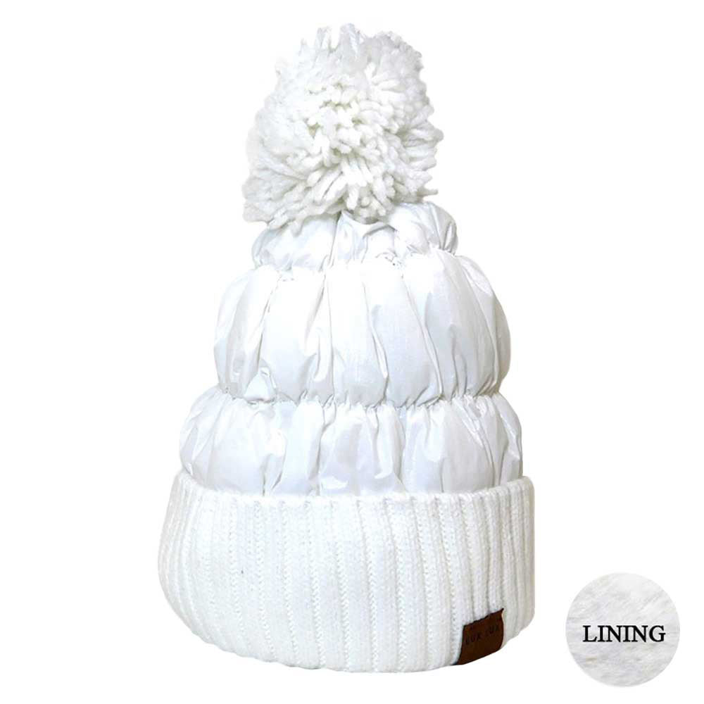 White Puffer Knit Pom Pom Glossy Winter Cozy Beanie Hat. Before running out the door into the cool air, you’ll want to reach for this toasty beanie to keep you incredibly warm. Accessorize the fun way with this puffer knit pom pom hat, it's the autumnal touch you need to finish your outfit in style. Awesome winter gift accessory!