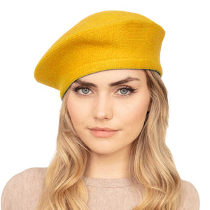 Yellow Blue Trendy Fashionable Winter Stretchy Solid Beret Hat, this Women Beret Hat Solid Color Stretchy Beret Cap doubles as a rain hat and is snug on the head and stays on well. It will work well to keep the rain off the head and out of the eyes and also the back of the neck. Wear it to lend a modern liveliness above a raincoat on trans-seasonal days in the city.