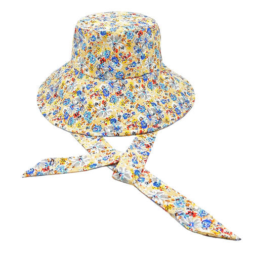 Yellow Flower Patterned Chin Tie Bucket Hat. Let your love for Summer bloom with these Bucket Hat. Packable and super convenient to carry, can also be easily carried inside your bags. Perfect for protecting you on a hot Summer day at the beach or keeping cool on the streets all while having your style completely intact!