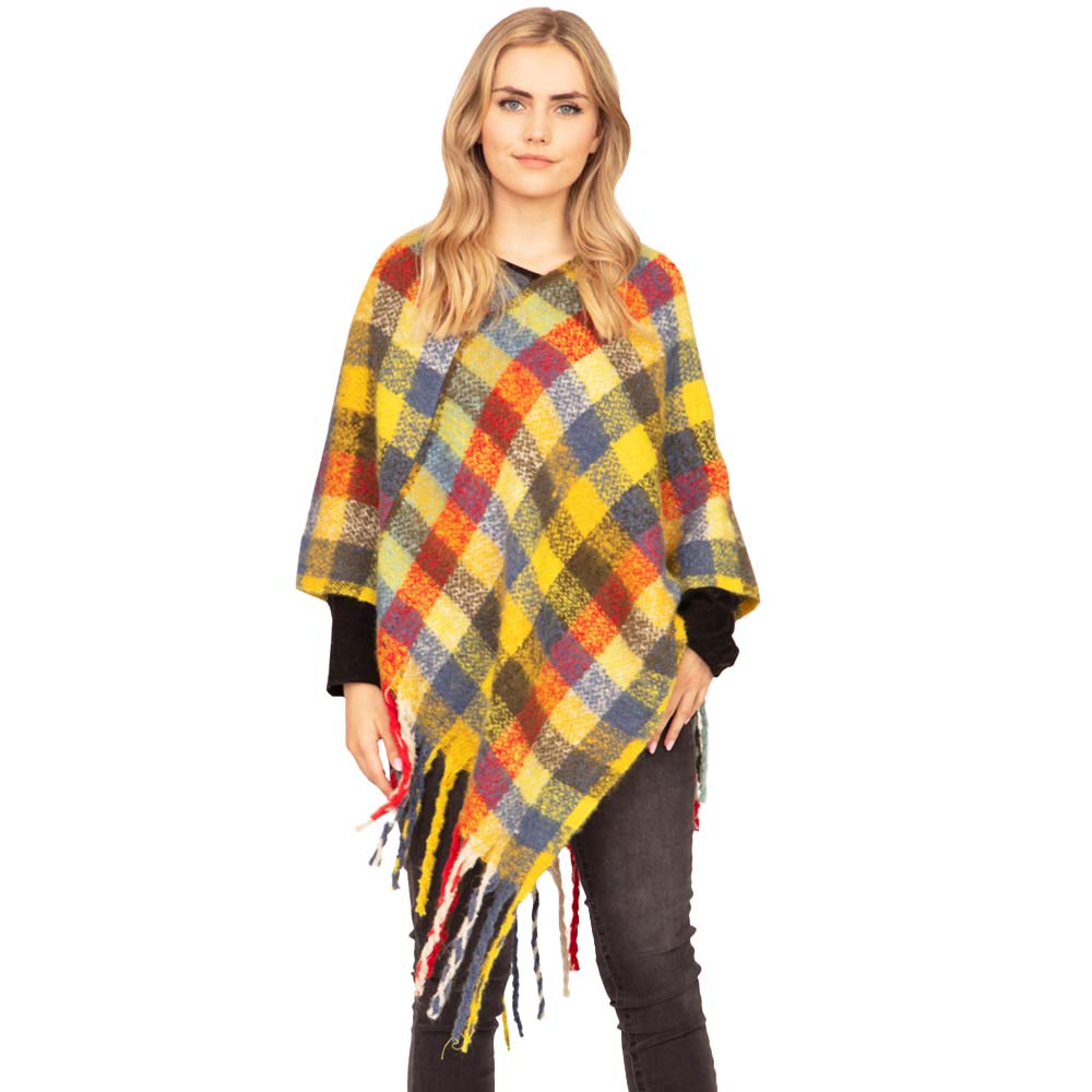 Yellow Trendy Plaid Check Patterned Poncho, is absolutely beautiful wear to make you stand out and keep you warm and toasty in the cold weather or winter. It ensures your upper body keeps perfectly toasty when the temperatures drop. It's the timelessly beautiful poncho that gently nestles around the neck and feels exceptionally comfortable to wear. Attractive and eye-catchy fashion wear that will quickly become one of your favorite accessories for daily wear in winter.
