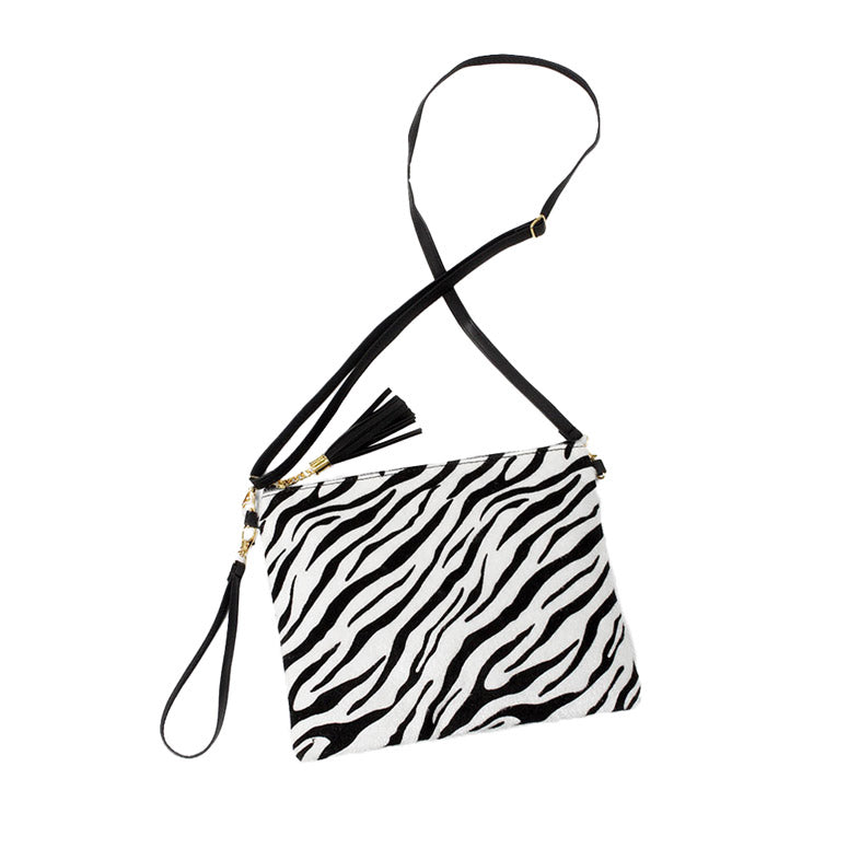 Zebra Faux Hair Crossbody Bag Zebra Faux Hair Clutch Wristlet bag detachable strap. Ever so classic zebra gives you the ultimate fashionista look while carrying this trendy aminal print bag! It will be your new favorite carry all crossbody. Gift for Birthday, Christmas, Anniversary, Valentine's Day, cumpleanos, navidad